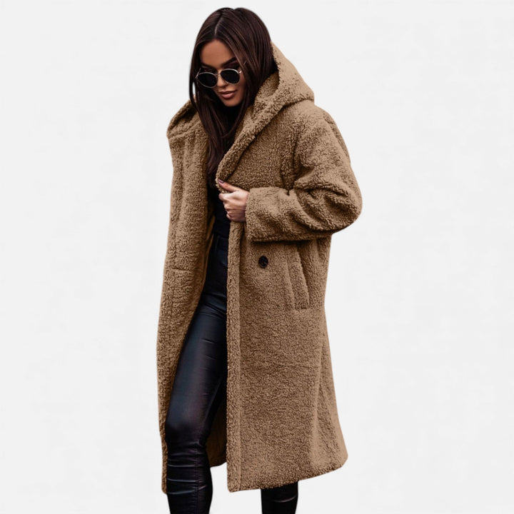 Cozy women's long plush winter coat, elegant and warm for any cold weather occasion.