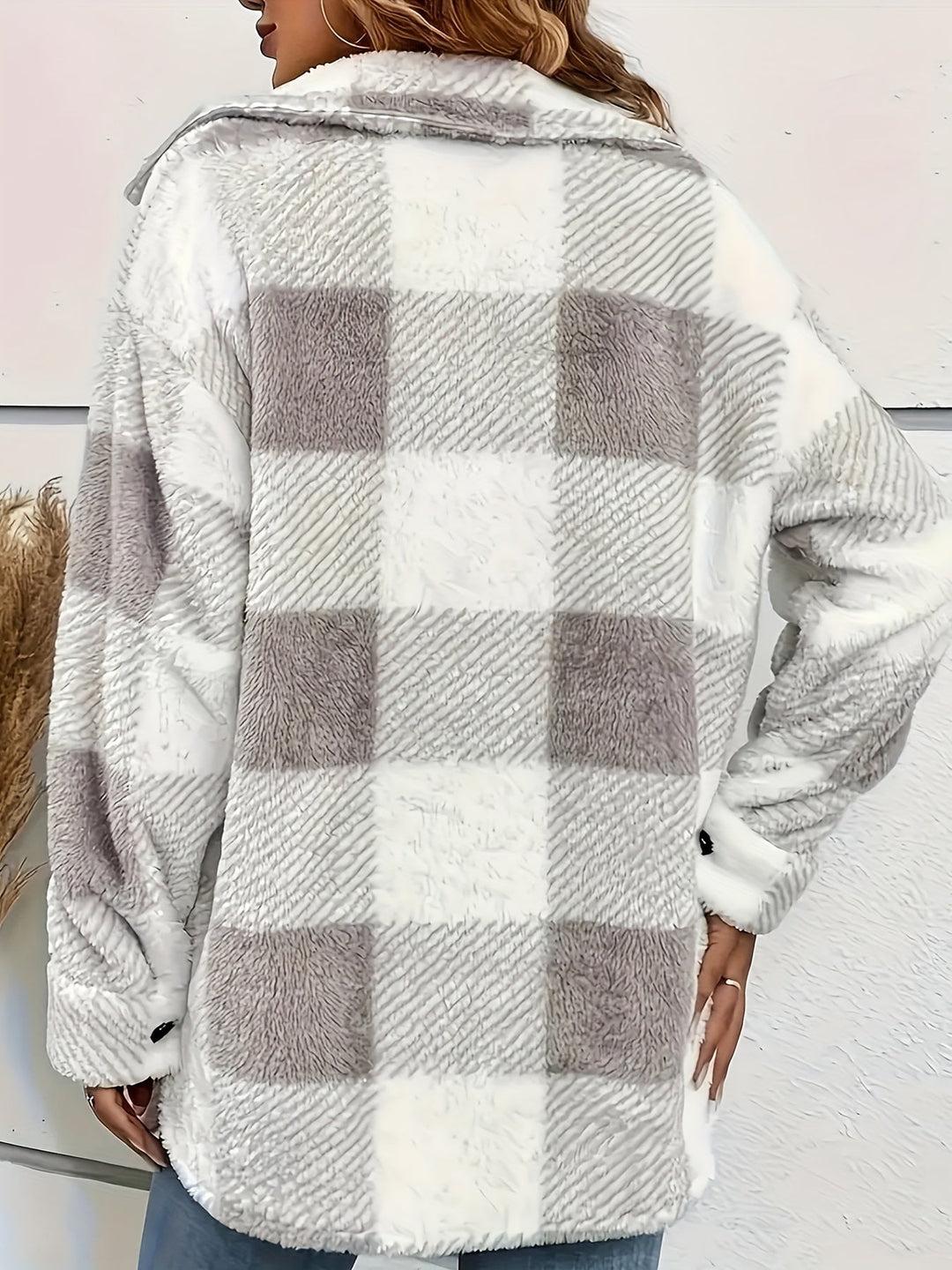 Women's casual plaid button-up jacket paired with jeans, relaxed fit, autumn apparel