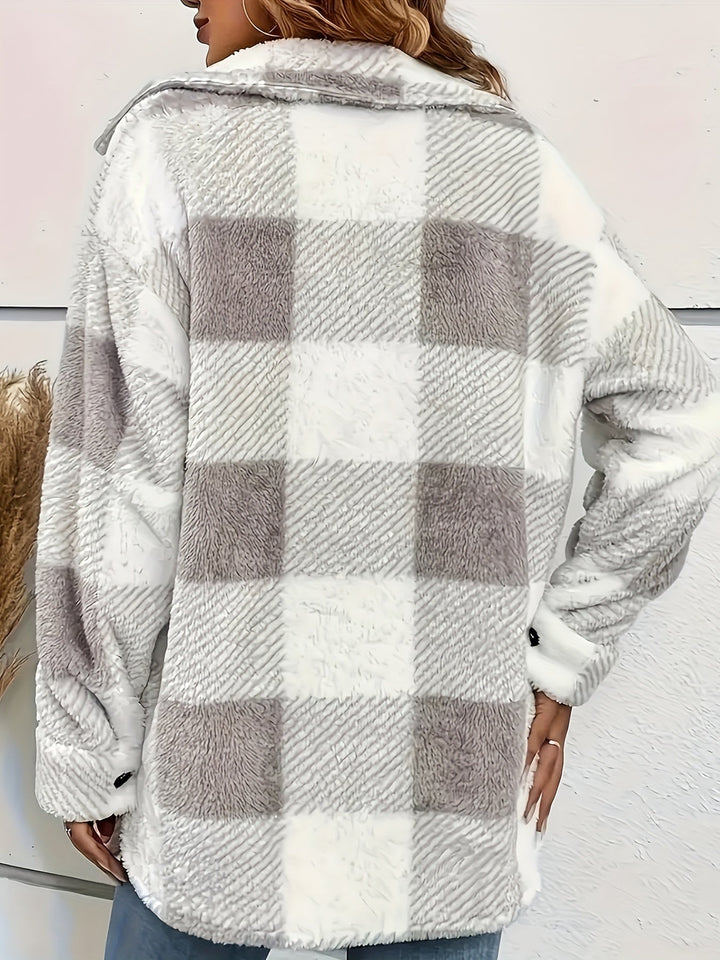 Women's casual plaid button-up jacket paired with jeans, relaxed fit, autumn apparel