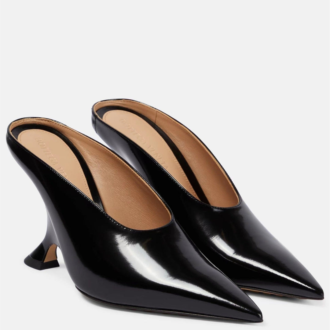 Fashion-forward women's party mules: metallic finish, pointed toe, comfortable wedge, sculpted heel.