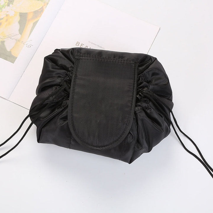 Multi-functional women's drawstring makeup & toiletry travel organizer.