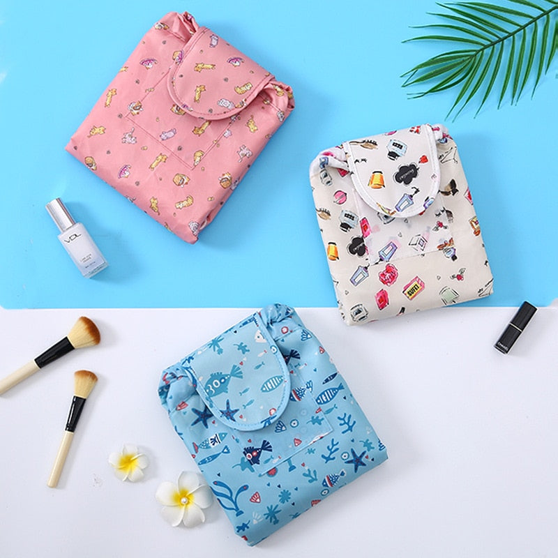 Compact women's drawstring makeup bag, ideal for travel & gym.