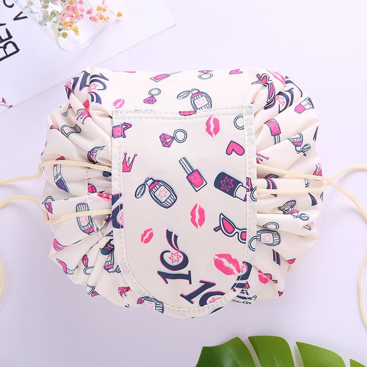 Portable drawstring storage bag for women's beauty products, travel essential.
