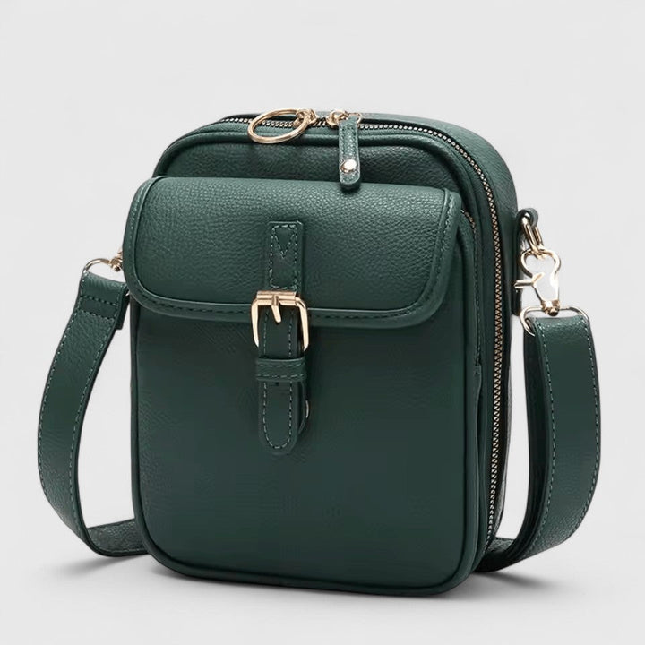 Stylish women's everyday shoulder bag with adjustable strap, suitable for casual spring accessories.
