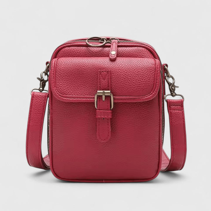 Close-up of a women's compact shoulder bag, highlighting material and design for everyday use.