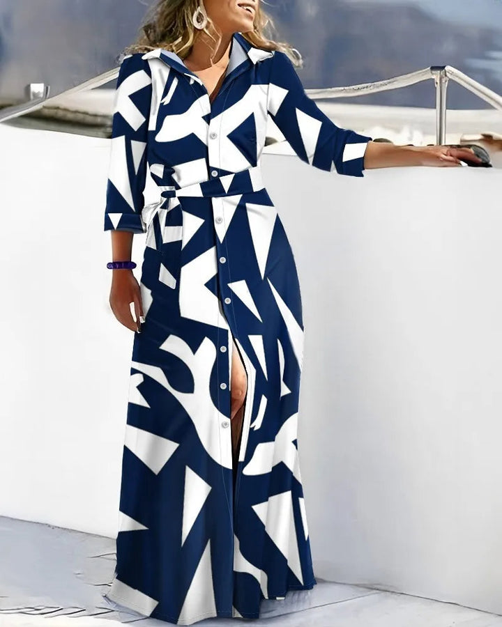 Women's printed long sleeve midi shirt dress with a stylish belt. Versatile day or evening wear.