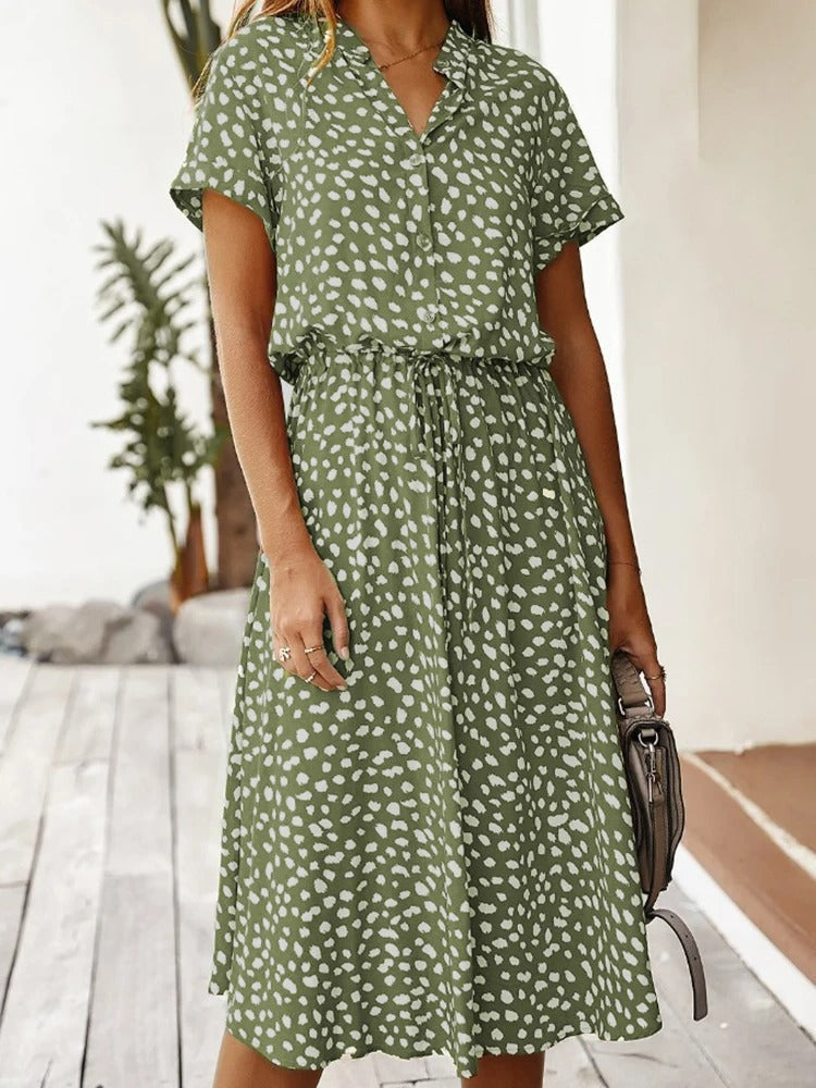 Chic women's printed midi dress, short sleeve style with an adjustable waist, a must-have summer piece.
