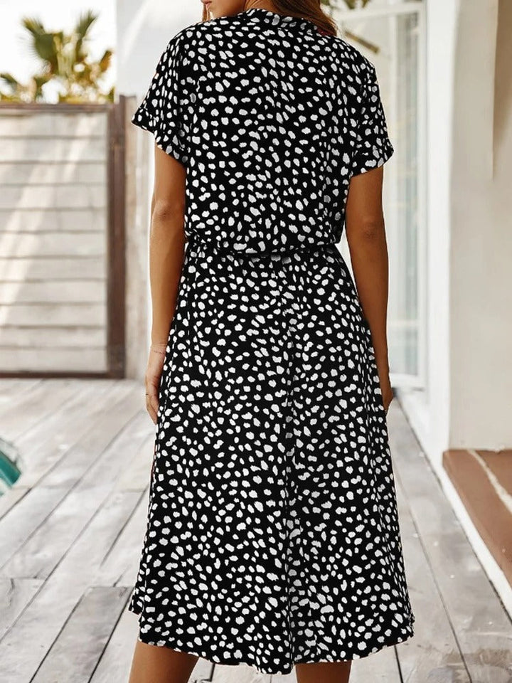 Beautiful women's printed midi dress, lightweight, short sleeve, and adjustable waist for ultimate comfort.