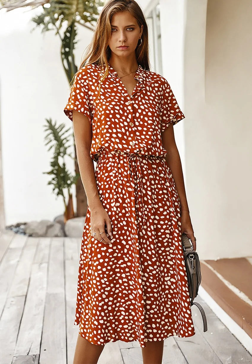 Short sleeve printed midi dress for women, featuring an adjustable waist for comfort & fit.