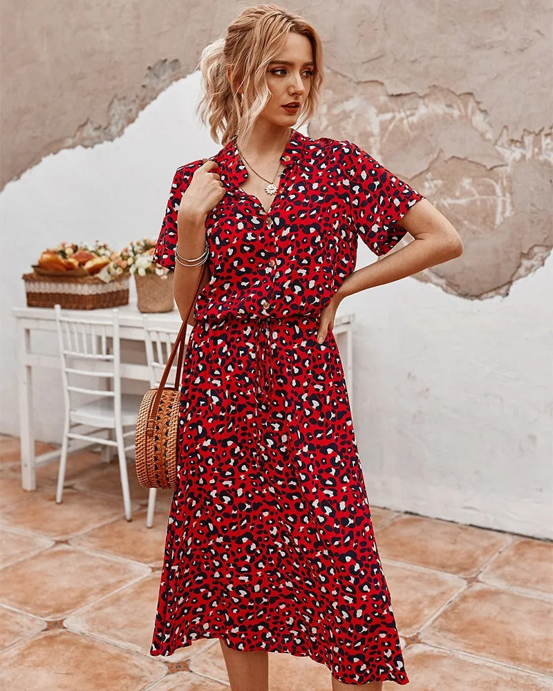 Elegant women's printed midi dress, short sleeve design with a flattering adjustable waist.