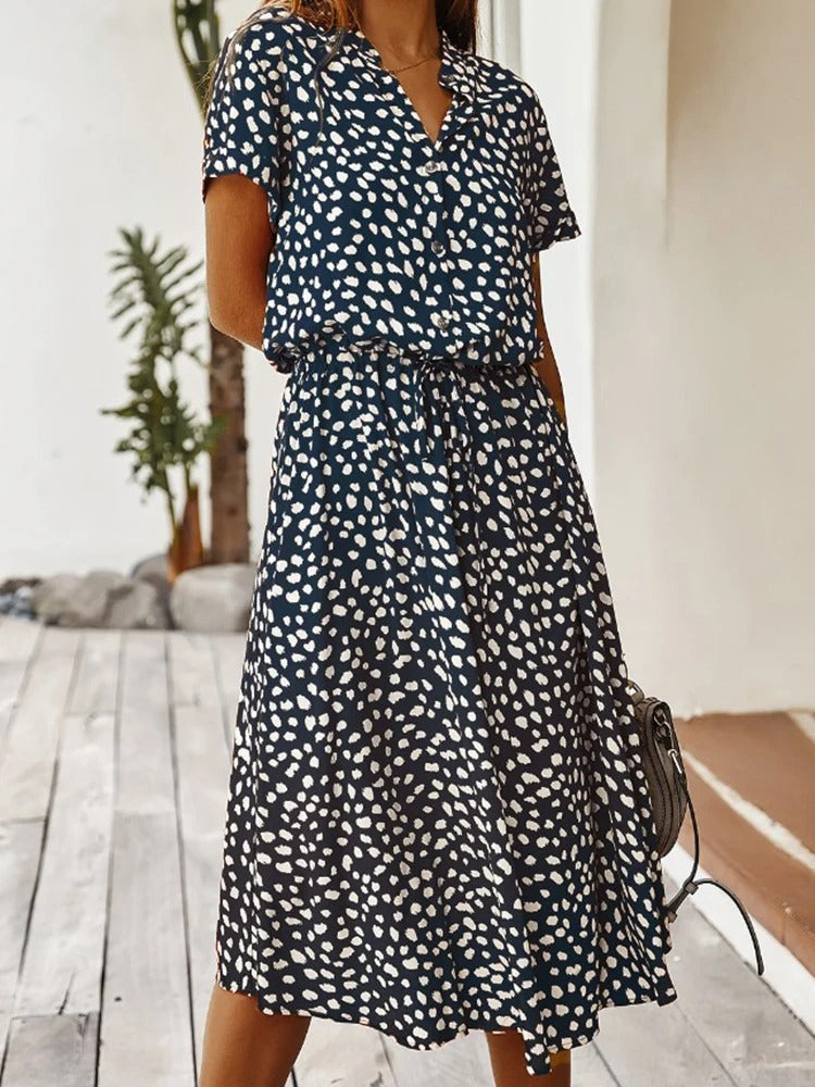Versatile women's printed midi dress, short sleeve & adjustable waist for day, vacation or casual wear.