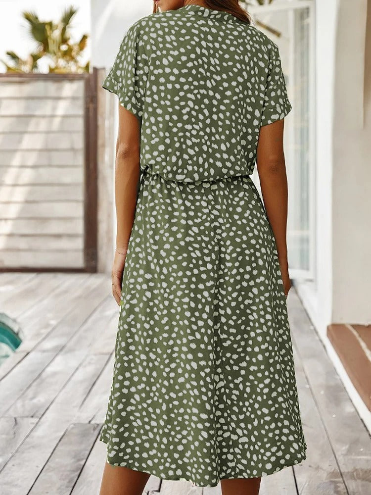 Lightweight & comfortable women's printed midi dress, short sleeves & adjustable waist, perfect for summer.