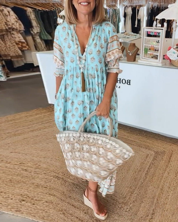 Women's printed V-neck midi dress, sleeveless & flowy for summer casual wear