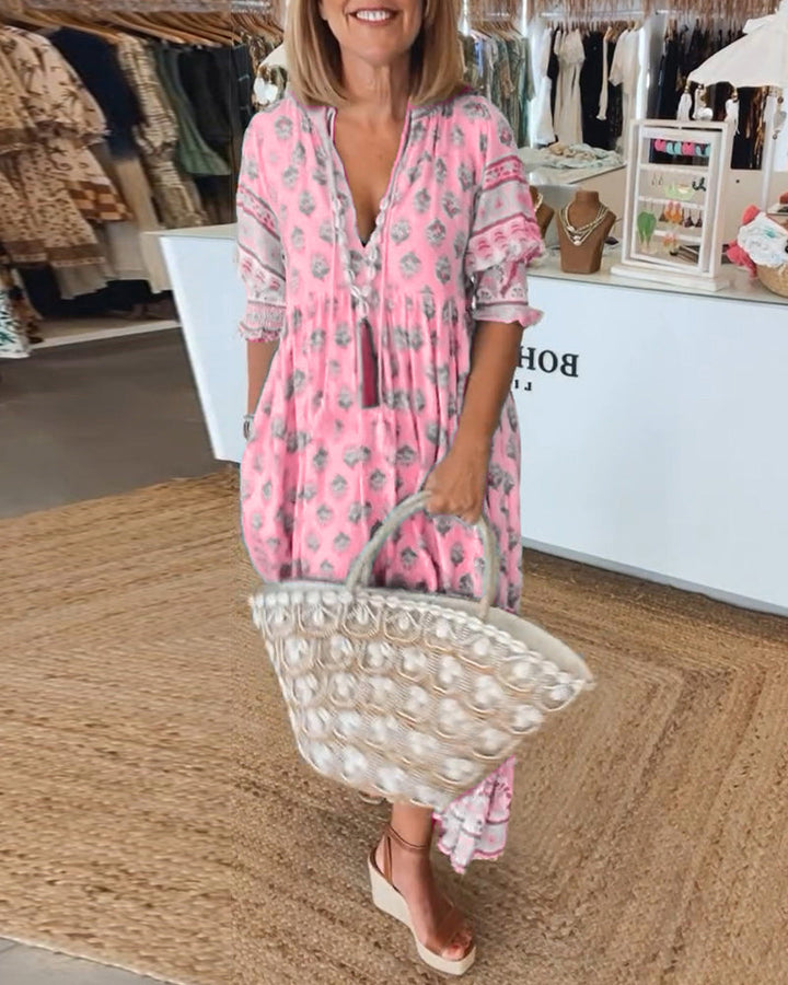 Comfortable printed midi dress, V-neck, women's summer attire, flowy silhouette