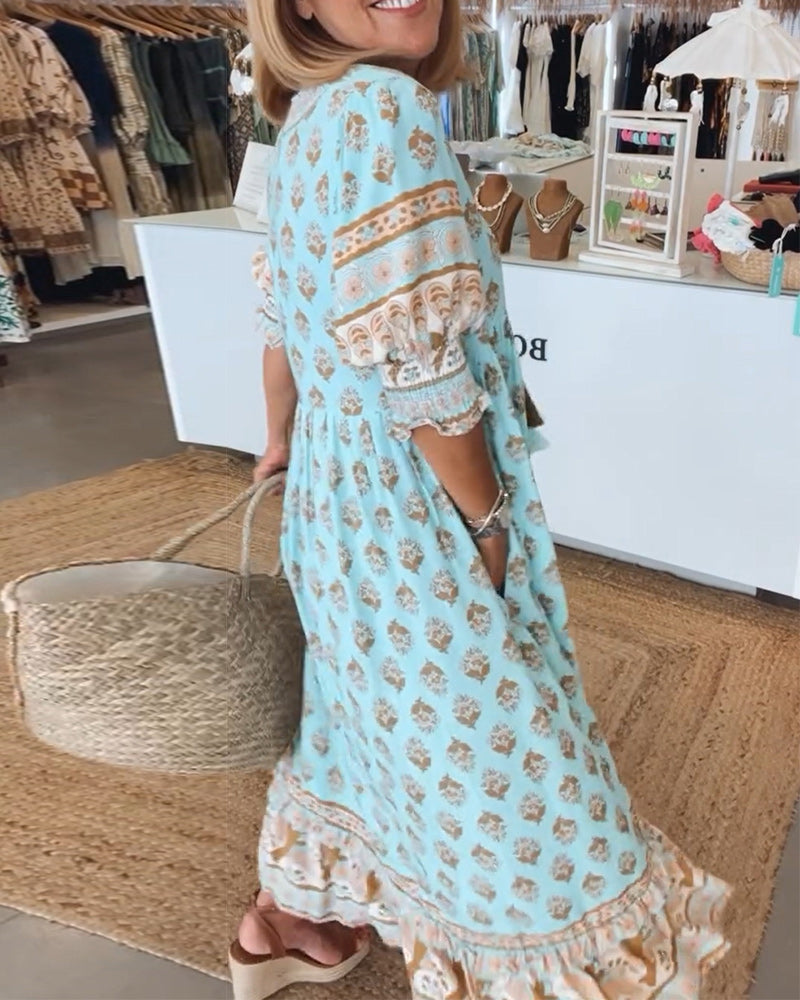 Sleeveless V-neck printed midi dress for women, ideal for summer and casual outings