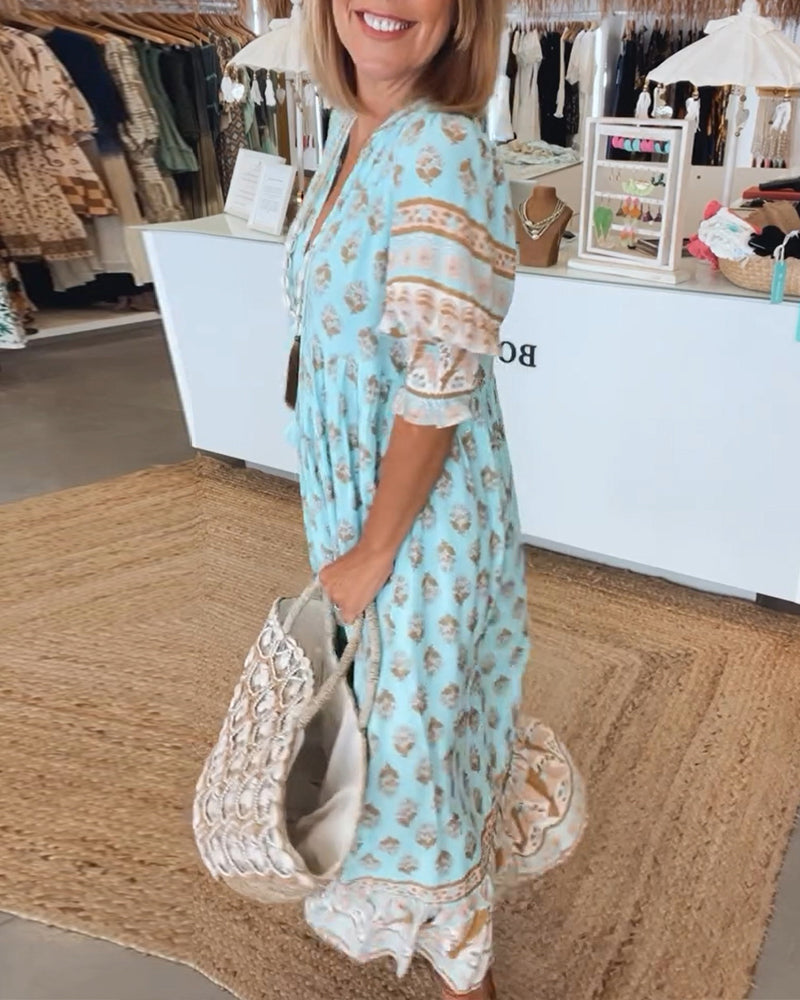 Casual women's printed midi dress with V-neck, sleeveless, great for warm weather