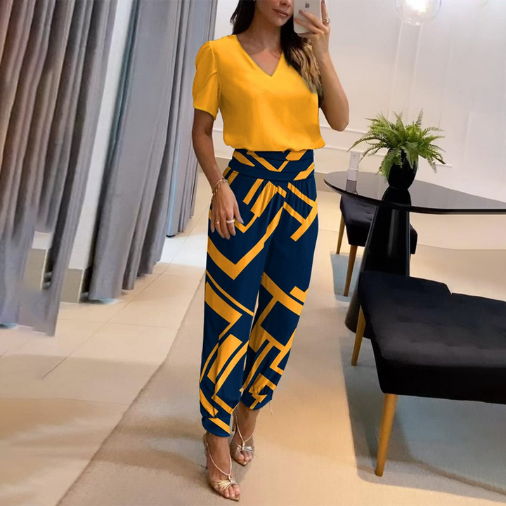 Stylish women's printed wide leg jumpsuit featuring a flattering V-neck, great for summer comfort.