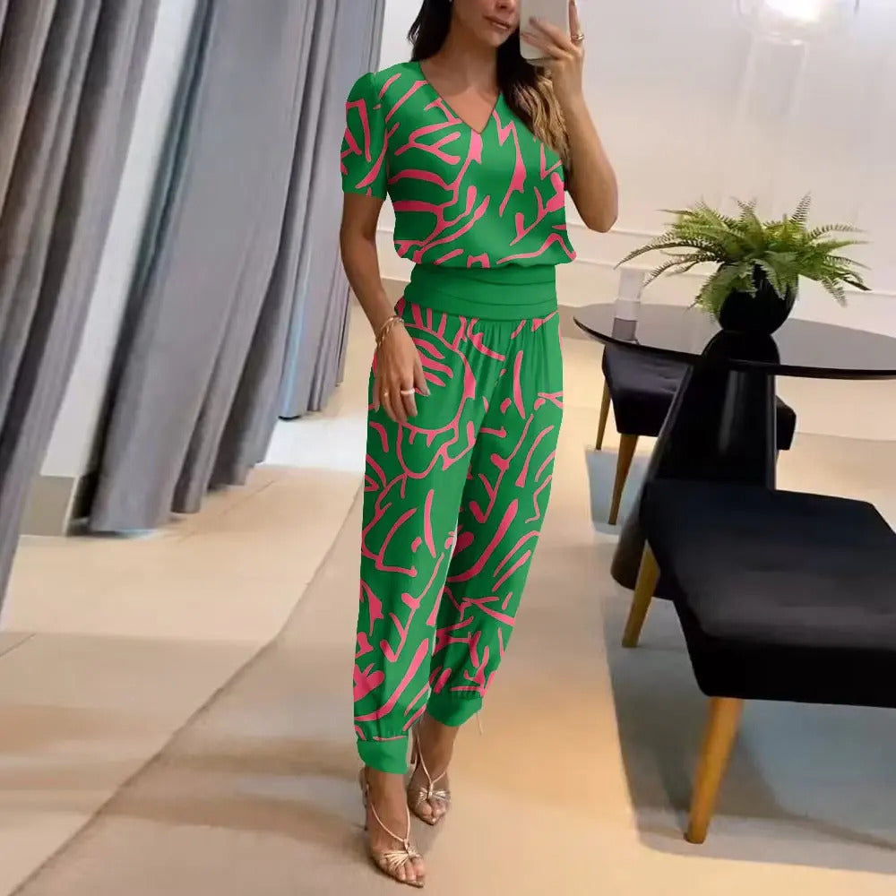 Chic women's printed V-neck wide leg jumpsuit, a comfortable and versatile piece for any casual elegant look.