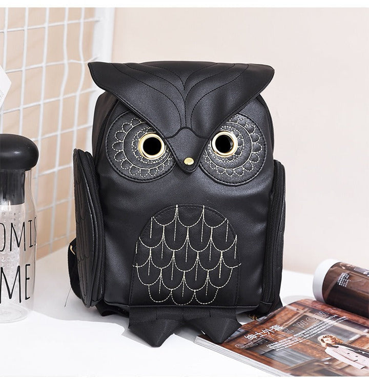 Women's PU leather owl print backpack with multiple pockets, perfect for casual style & organization.