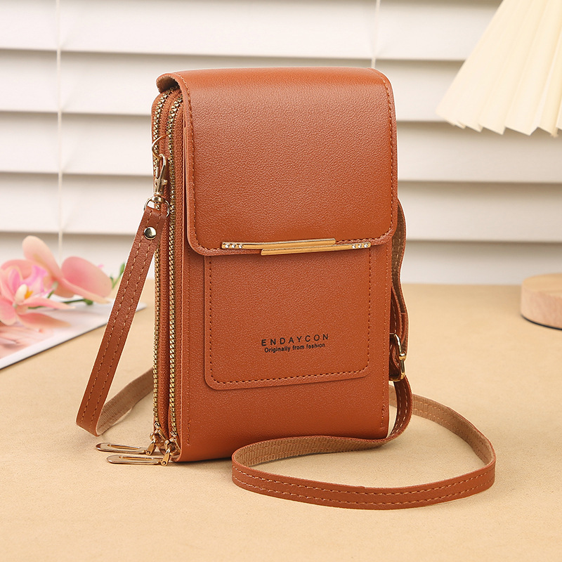 Stylish women's compact crossbody phone wallet bag for daily essentials, featuring a clear touchscreen window.