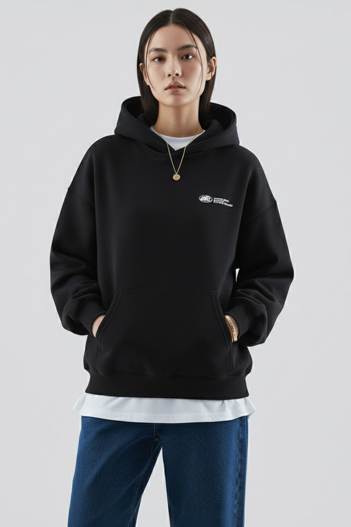 Relaxed fit women's graphic print pullover hoodie, combining comfort and casual style.