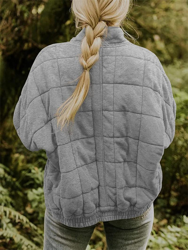 Trendy women's fall jacket, quilted and lightweight with a convenient zip-up front.