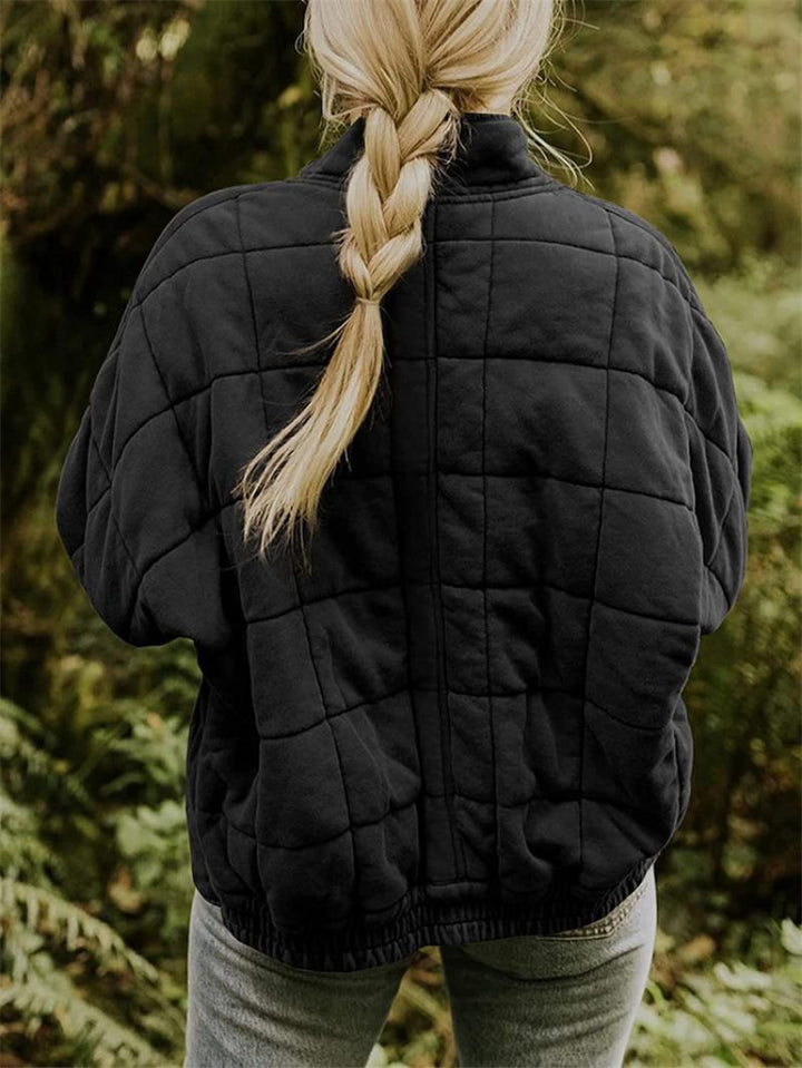 Practical women's lightweight quilted jacket, perfect for layering during spring and fall.