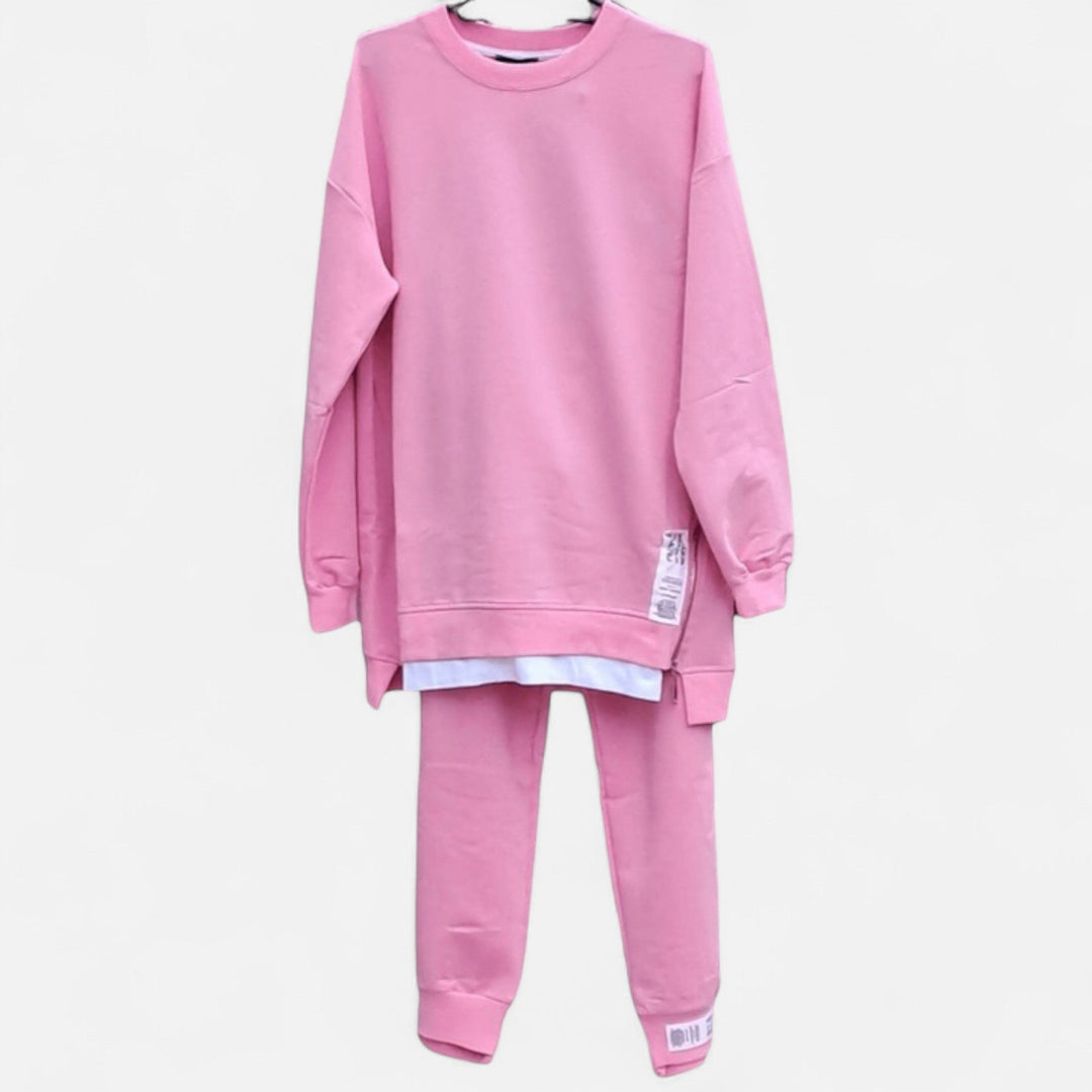Refined women's two-piece set, featuring a stylish slit sweatshirt and comfortable slim pants for modern fashion.
