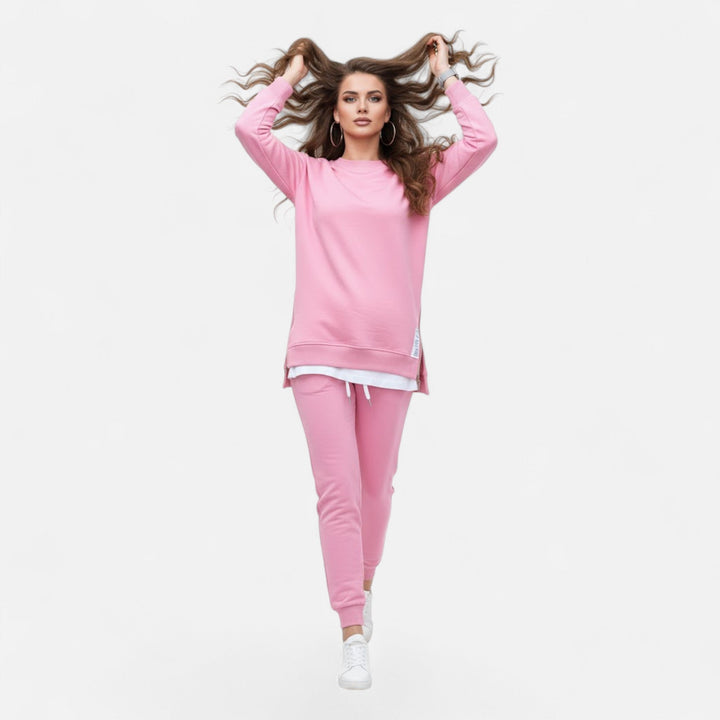 Women's comfy two-piece apparel: a modern slit sweatshirt and slim pants. Perfect versatile fall/spring outfit.