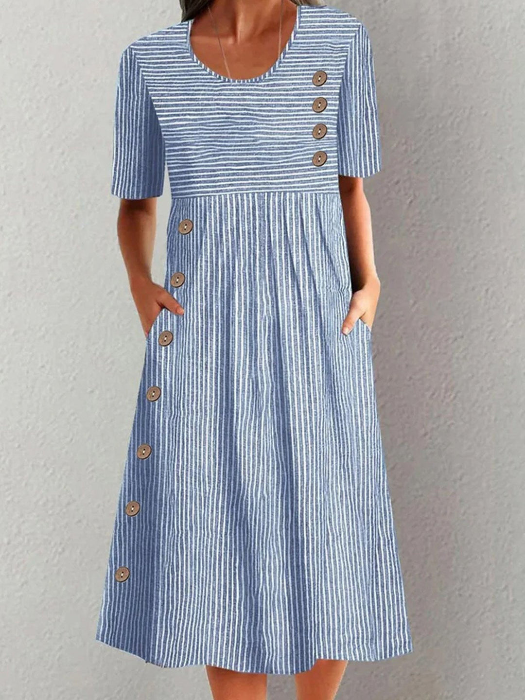 Women's relaxed fit blue striped midi dress with short sleeves, ideal for casual summer everyday wear.