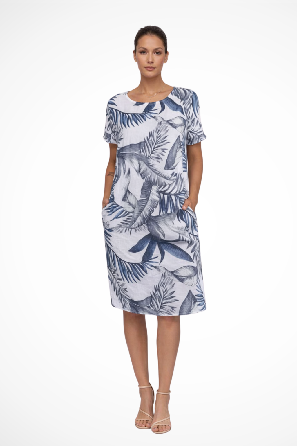 Sleeveless botanical print shift dress for women. Casual and breezy summer style.