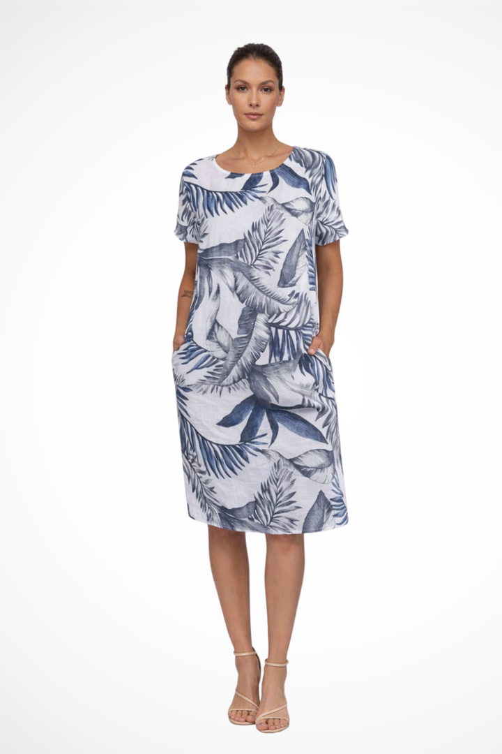 Sleeveless botanical print shift dress for women. Casual and breezy summer style.