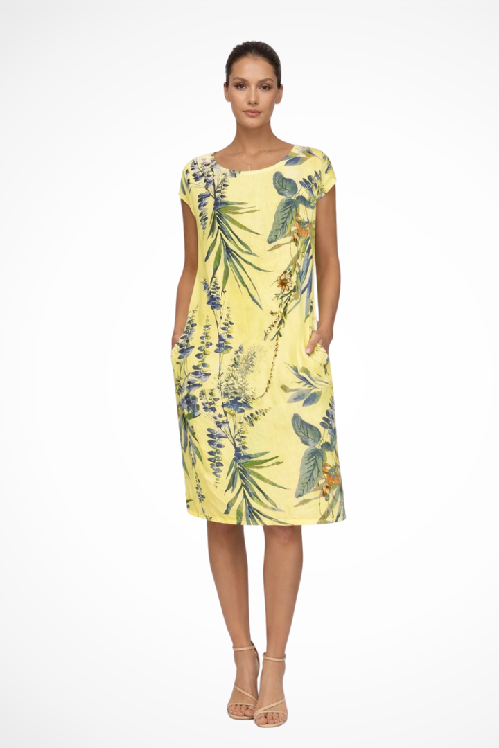 Versatile women's botanical print day dress, relaxed fit, sleeveless, great for summer vacation.