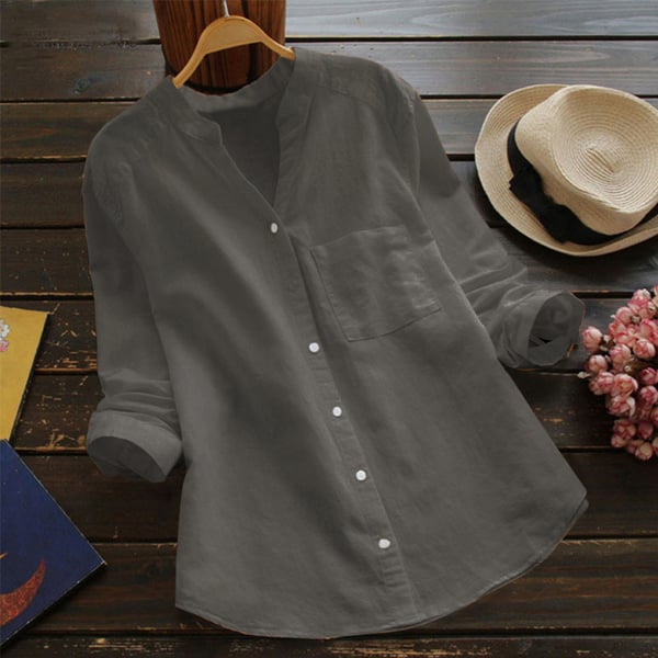 Cream colored relaxed fit women's button-down blouse, a comfortable fashion essential