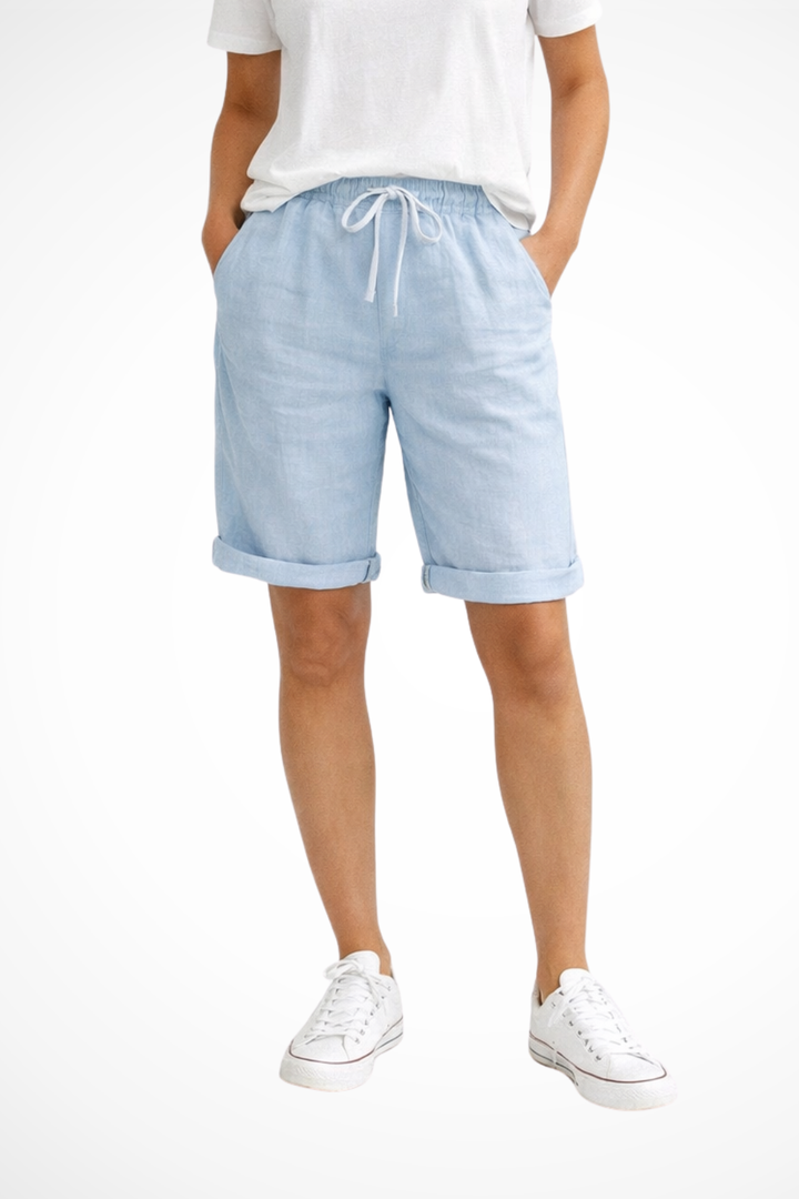 Comfortable women's cropped capri trousers with drawstring waist and pockets for casual summer wear.