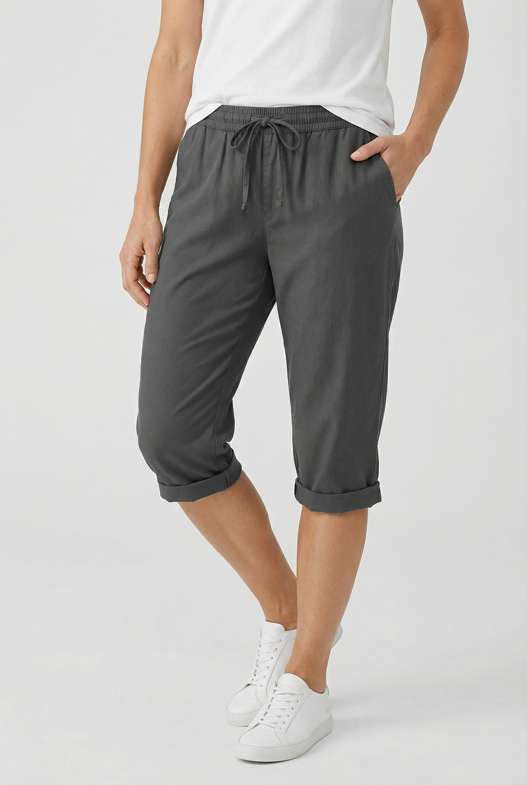 Soft women's relaxed fit capri pants with elastic waist & pockets, great for warm weather.