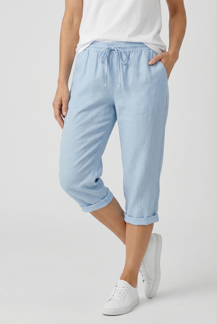 Close-up of pockets on women's relaxed fit capri pants with elastic waist, designed for comfort.