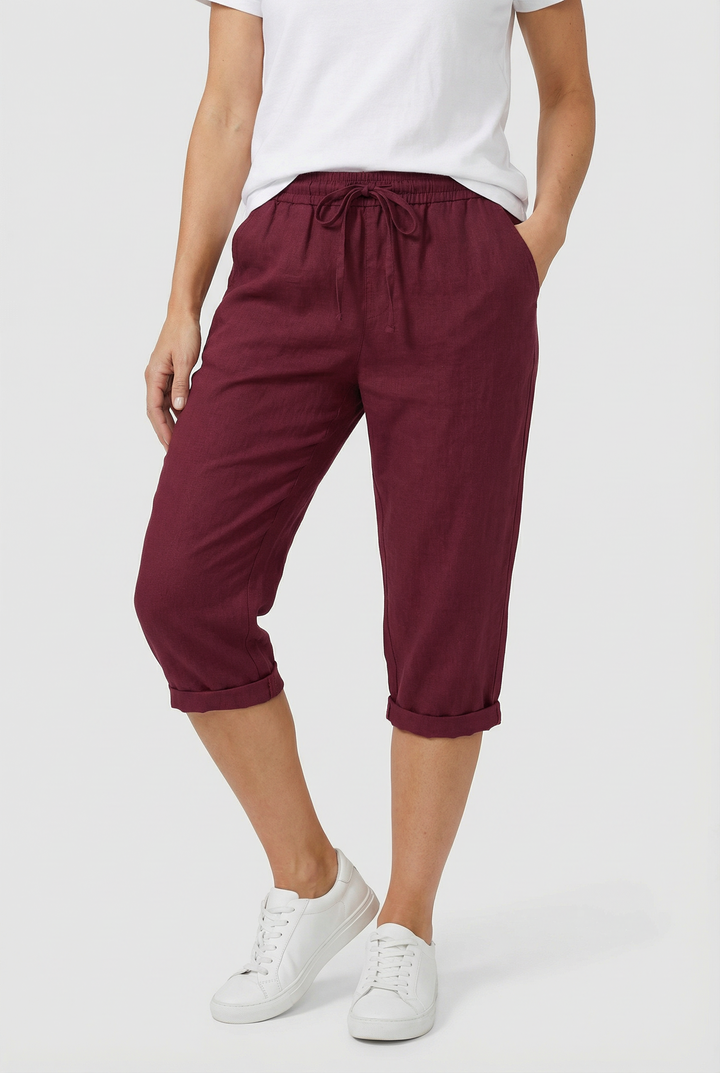 Versatile women's relaxed fit cropped pants, perfect for summer, featuring elastic waist & pockets.