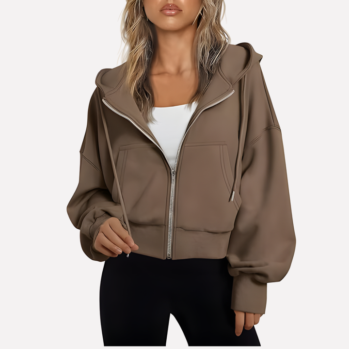 Women's versatile cropped zip-up. Relaxed fit drawstring jacket, perfect for athleisure or everyday outings.