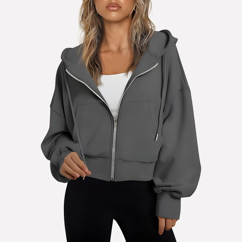 Modern casual women's cropped zip hoodie. Relaxed fit and drawstring for a versatile and fashionable statement.