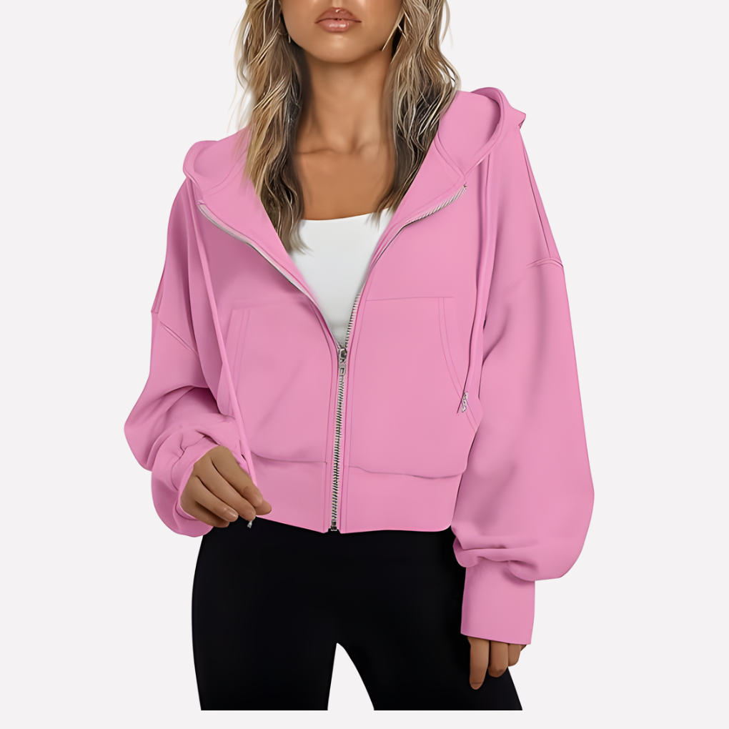 Modern women's zip hoodie. Cropped length, relaxed fit, and drawstring detail for a chic casual jacket.