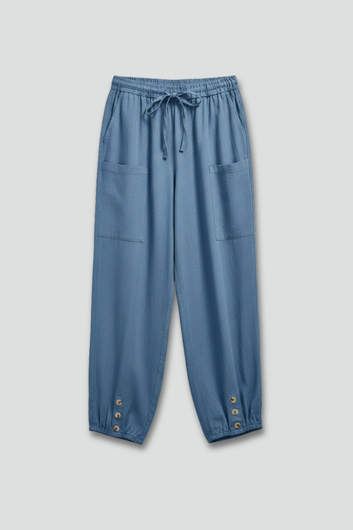 Women's relaxed fit drawstring waist trousers with button hem detail, ideal for summer fashion.