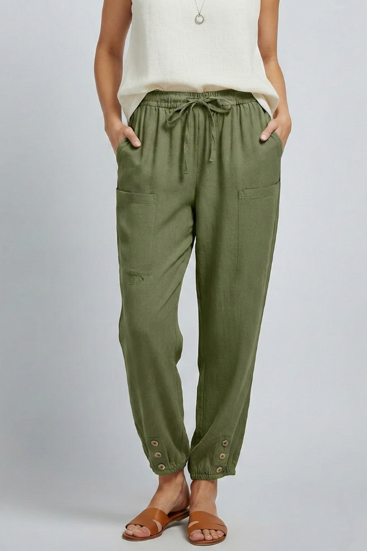 Women's casual fashion trousers: drawstring waist and button hem for a relaxed summer look.