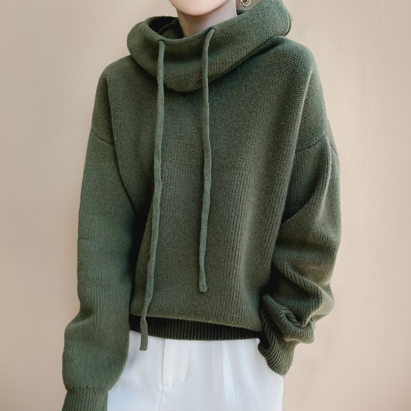 Close-up of a comfortable women's knit hoodie featuring a stylish cowl neck and relaxed silhouette.