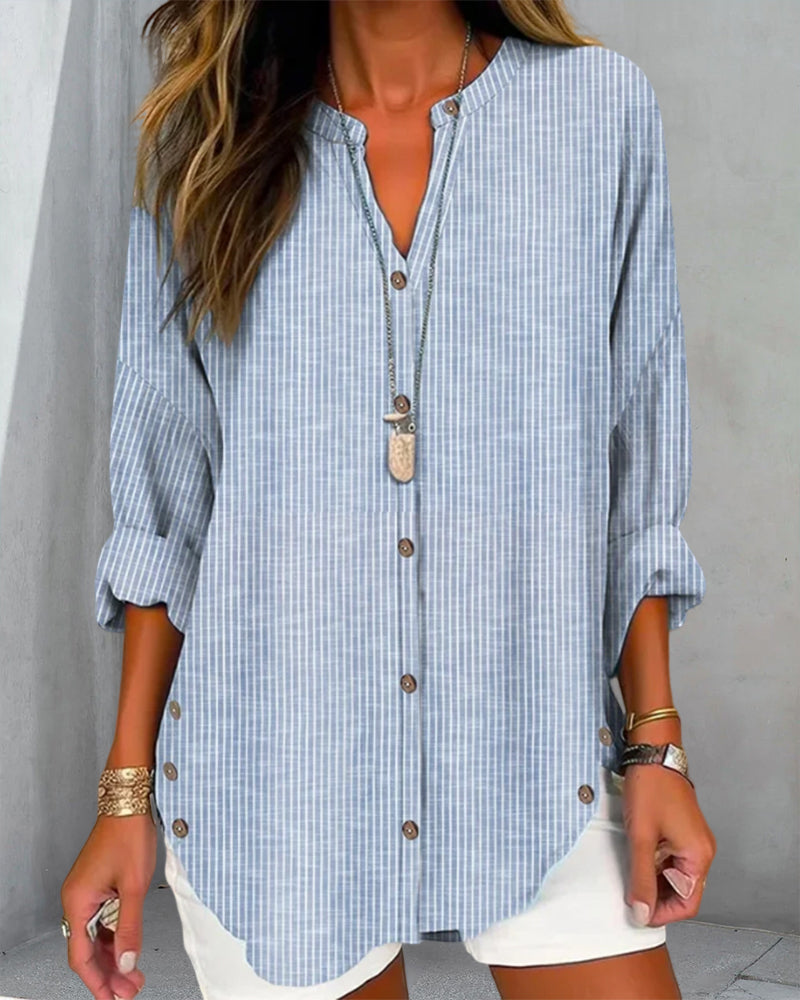 Versatile women's casual striped blouse, featuring a button front and relaxed fit for comfort.