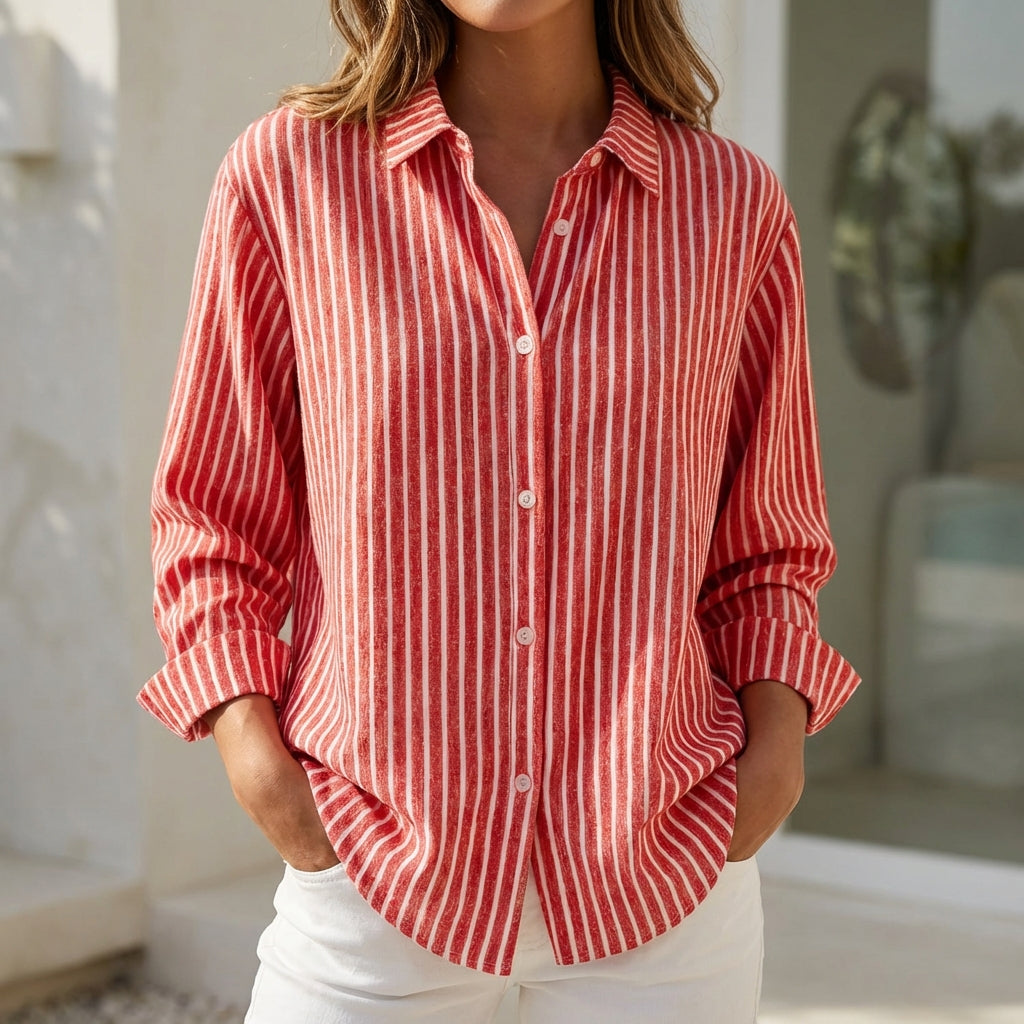 Women's relaxed fit striped button-down blouse, perfect for summer casual elegance or resort wear.