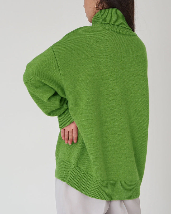 Comfortable women's long sleeve turtleneck sweater, perfect for layering during spring