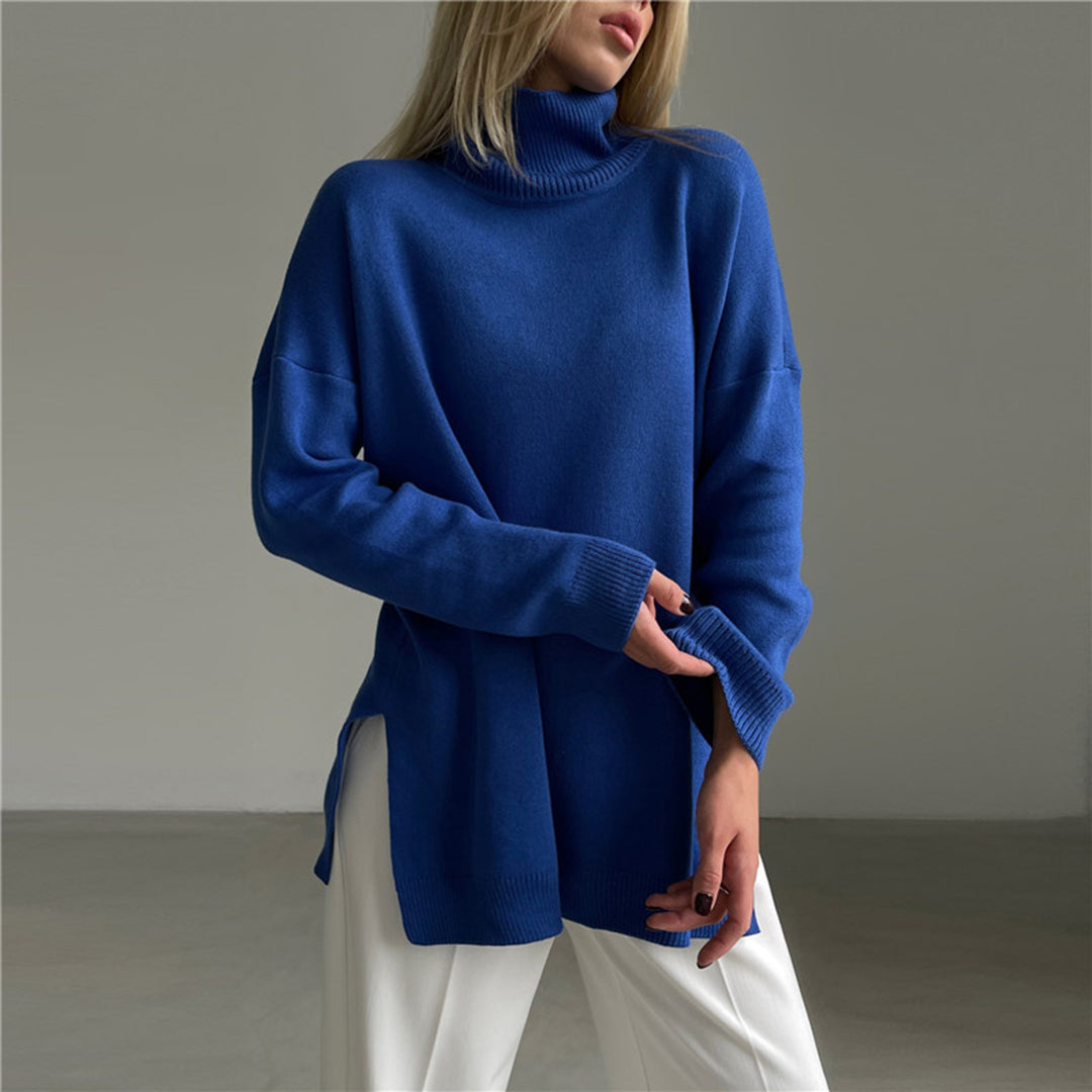 Soft women's relaxed fit turtleneck sweater, long sleeves & chic side splits. Comfortable & elegant winter wear.