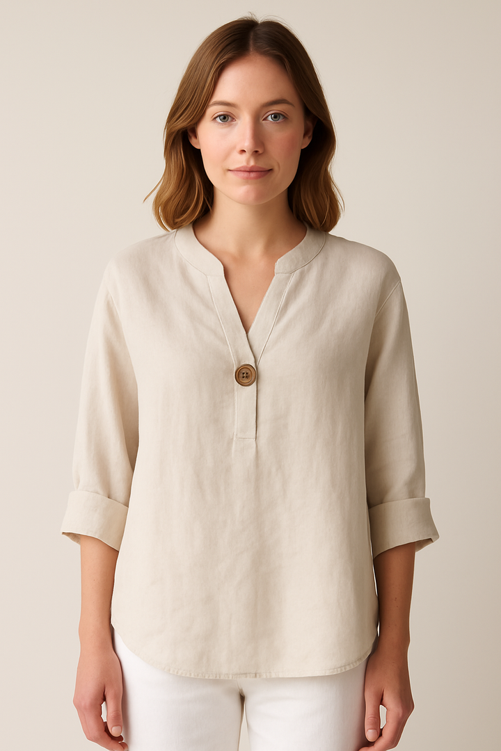 Women's relaxed fit V-neck blouse with button detail, perfect for casual summer wear.