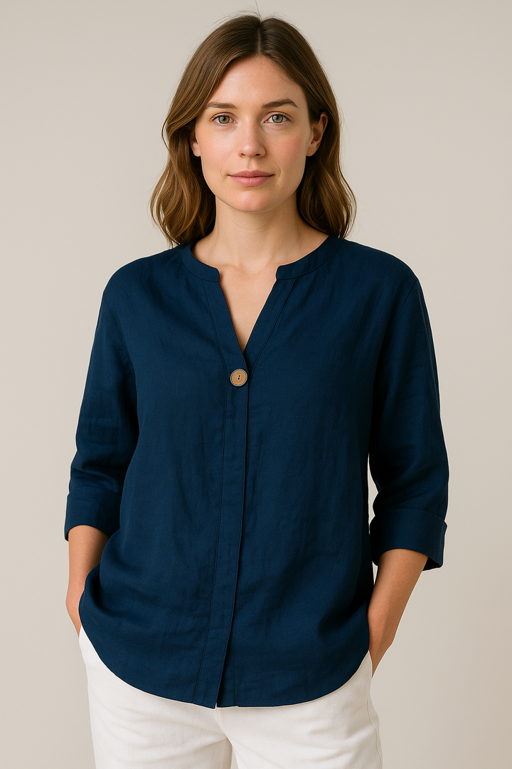 Fashionable women's lightweight V-neck blouse with front button accents, ideal for versatile styling.